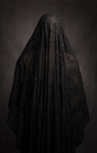 Fine Art Portrait Of Naked Woman Covered By Lace Veil In Dark Painterely Studio Setting