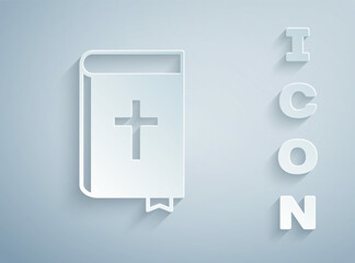 Sticker - Paper cut Holy bible book icon isolated on grey background. Paper art style. Vector