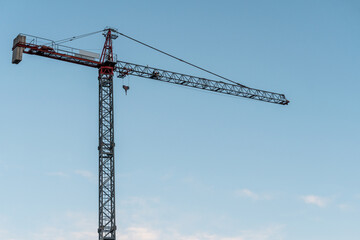 construction crane against blue sky