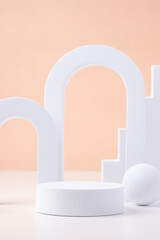 Aufkleber - Geometric pedestal block on white table and pastel peach background.mockup for display product