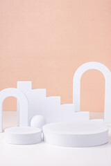 Aufkleber - Geometric pedestal block on white table and pastel peach background.mockup for display product
