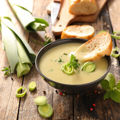 Canvas Print - leek soup and bread slice in bowl