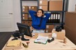 © Krakenimages.com - Young hispanic woman ecommerce business worker relaxed with hands on head at office