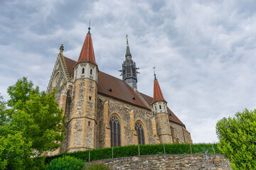 Wall Mural - Mariasdorf with the famous parish church 