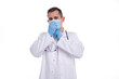© Alex - Male Doctor Puts on Medical Mask Isolated. Man Doctor Medical Workwear. Medical Concept