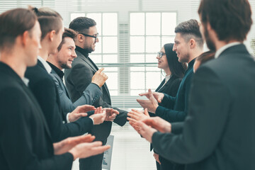 Wall Mural - close up. two business teams applauding their leaders