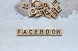 The word facebook composed of wooden letters.