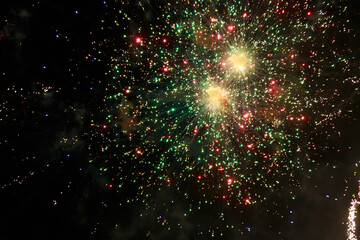 Fireworks sparks on a black sky background. graphic resource for design. Blank for the designer. Underlay or undercoat