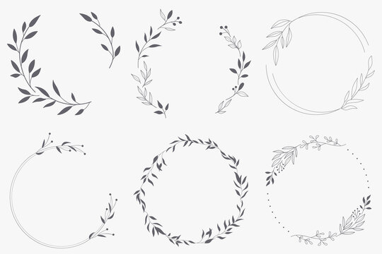 floral wreath branch in hand drawn style. floral round gray and white frame of twigs, leaves and flo