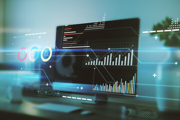 Digital business chart interface on blurry office interior background with computer monitor on desktop. Finance, trade, technology and future concept. Double exposure.