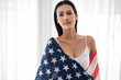 © u photostock - portrait sexy asia woman with USA flag