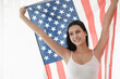 © u photostock - portrait sexy asia woman with USA flag