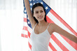 © u photostock - portrait sexy asia woman with USA flag