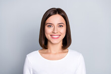 Photo Of Optimistic Brunette Millennial Lady Wear White Shirt Isolated On Grey Color Background