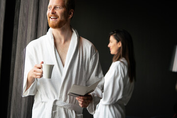 Poster - Handsome man in bathrobe relaxing at spa wellness hotel