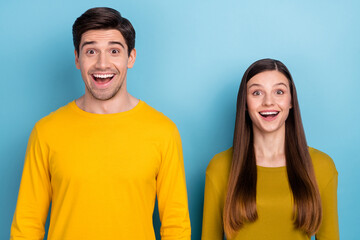 Poster - Photo of excited amazed funky couple people wow reaction wear yellow casual outfit isolated blue color background