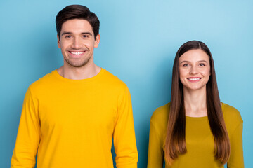 Sticker - Photo of cheerful positive people shiny beaming smile wear yellow casual outfit isolated blue color background