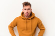 © Asier - Young caucasian man isolated on white background funny and friendly sticking out tongue.