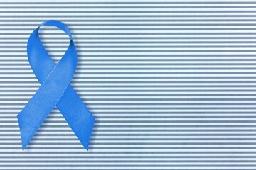 Canvas Print - Prostate care. Awareness of men's health in November with blue ribbon