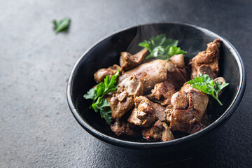 chicken liver fried stewed offal meal snack on the table copy space food background rustic. top view keto or paleo diet