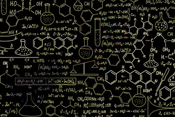 Hand drawn science formulas on chalkboard for background.