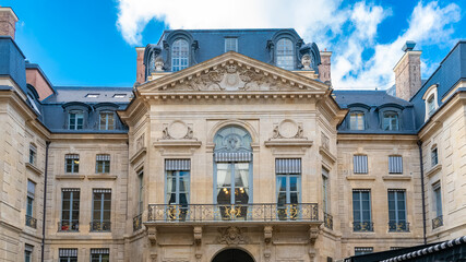 Paris, small square with beautiful buildings in the historic center
