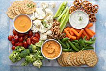 Plant Based Snack Board With Vegetables And Crackers