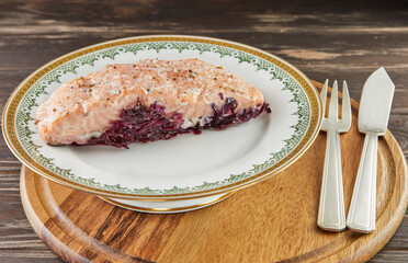 Wall Mural - Slice of salmon with stewed red cabbage and apples