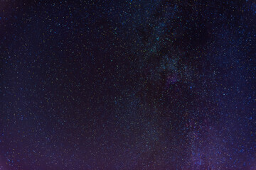 Wall Mural - Multicolored starry sky with many stars and the milky way at night. Scientific astrophotography of the cosmos with galaxies, nebulae and constellations