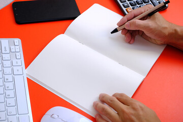 Poster - Man hands working on modern laptop. Office desktop and using smartphone 