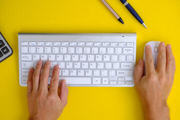 Poster - Top view of a working table, a working desk with a gadget and free space on the table for text and accessories, a laptop, a keyboard, a book, a note, and a coffee cup