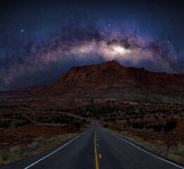 Canvas Print - the milky way galaxy over a desert road in sothwest us.