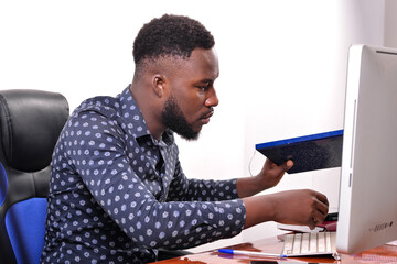 Wall Mural - young businessman working in the office.