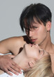 © Volodymyr - Sensual kiss, Man kissed woman. Sensual passionate couple gently kissing, enjoying tenderness and intimacy. Young sexy affectionate coupl. Romantic lovers face each other.