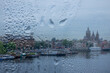 View Through a Rainy Window to the Panorama of Amsterdam