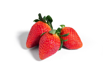 Wall Mural - Fresh seasonal strawberries isolated from the background