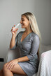© Alexandr - beautiful glamorous woman in dress with a glass of champagne