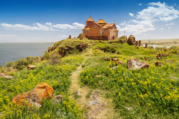 Wall Mural - Path leading to the famous ancient monastery of Hayravank in Armenia with the legendary Lake Sevan in the background. Travel attractions concept