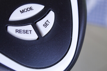 Poster - Mode reset and set buttons on gym equipment