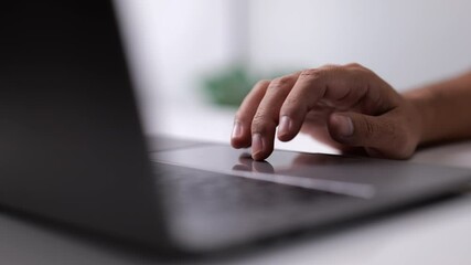 Poster - Close up of men hand using modern laptop