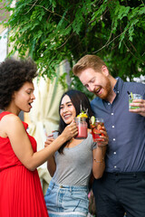 Poster - Group of friends having fun together. People talking laughing and enjoying their time