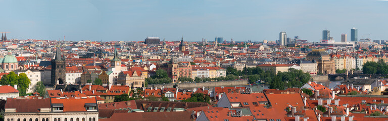 Wall Mural - Panorama of the rooftops of Prague. Prague skyline rooftop view with historical buildings panorama in Czech Republic.