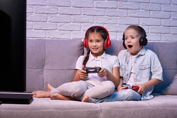 Poster - children playing video game with game console