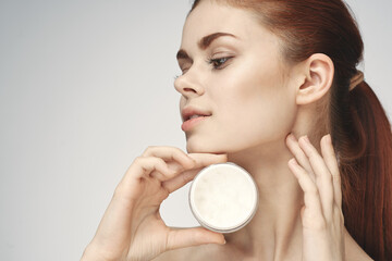 Poster - woman with jar of cream makeup face skin care close-up