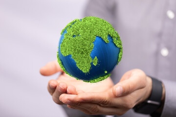 illustration with bold world map in green color