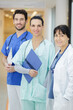© auremar - portrait of three medical workers stood in a row