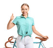© Pixel-Shot - Pretty teenage girl with bicycle showing thumb-up on white background