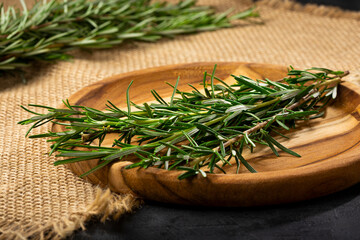 Fresh rosemary herb on the table.