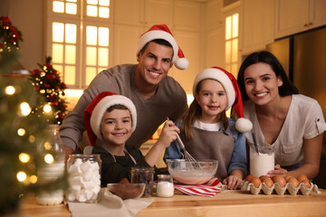 Poster - Happy family making dough for delicious Christmas cookies at home