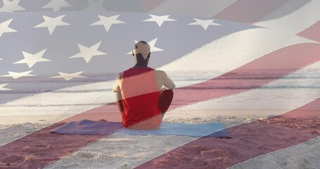 Canvas Print - Animation of flag of united states of america over african american man on beach